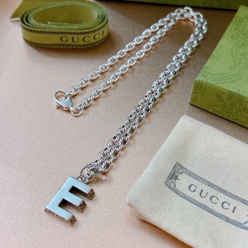 G*u*i necklaces